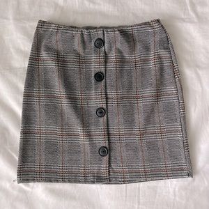 Tight fitting plaid skirt